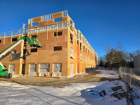 Five-story multifamily framing project in Lowell, Massachusetts